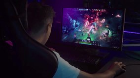 Participating in esports multiplayer online MOBA video game championship. Attacking the enemy monster character in a round of video game championship. Winning a match of video game championship