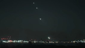 London airport timelapse of airplanes landing every 2 minutes as shot from a distant viewpoint with a telephoto lens - Powered by Shutterstock - Get 15% off with code: PIKWIZARD15
