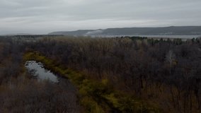 Autumn Tapestry Aerial Views of Russia Nature Drone Footage Over Volga River, Forest, and Mountains. Russia, Samara region
