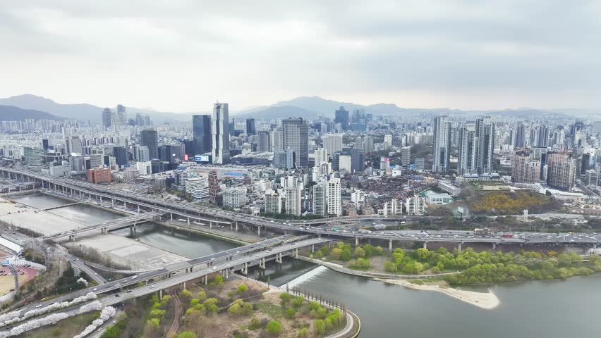 Drone View of Seoul city in South Korea, Ttukseom Island, Leisure city, Spring, 60fps