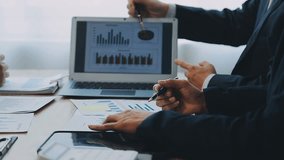 Strategic Business Discussion, Team Meeting for Market Growth and Financial Analysis, Dive into a collaborative business meeting where teams present strategies, consult with investors, and discuss - Powered by Shutterstock - Get 15% off with code: PIKWIZARD15