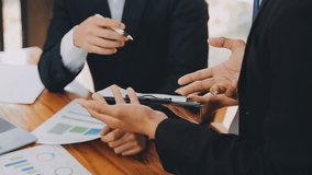 Strategic Business Discussion, Team Meeting for Market Growth and Financial Analysis, Engage in a strategic business discussion as teams convene to present, consult investors, and strategize new - Powered by Shutterstock - Get 15% off with code: PIKWIZARD15