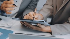 Strategic Business Discussion, Team Meeting for Market Growth and Financial Analysis, Participate in a strategic team meeting where business plans are presented, investors are consulted, and discuss - Powered by Shutterstock - Get 15% off with code: PIKWIZARD15