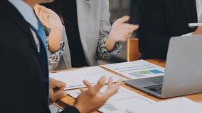 Strategic Business Discussion, Team Meeting for Market Growth and Financial Analysis, Collaborate with industry peers in a team meeting dedicated to presenting strategies, consulting investors - Powered by Shutterstock - Get 15% off with code: PIKWIZARD15