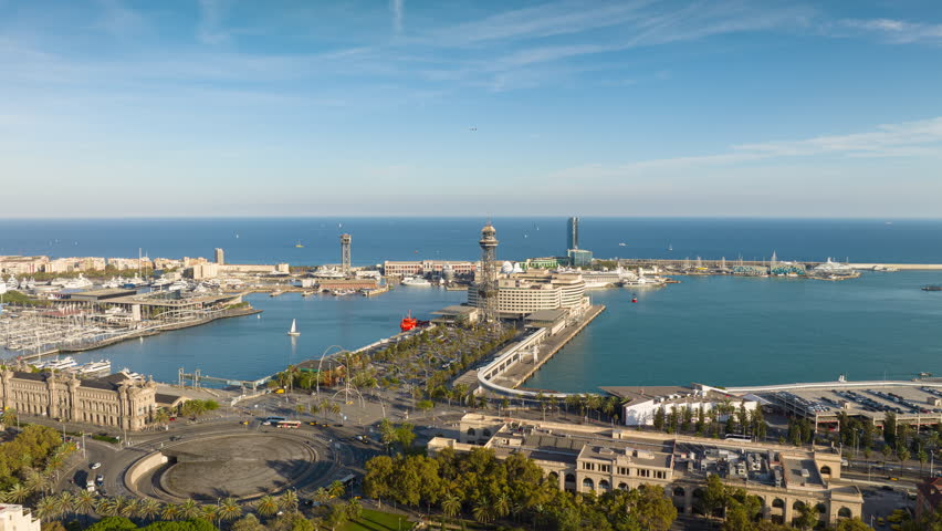 sunny day barcelona city famous central bay traffic square aerial panorama 4k timelapse spain