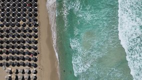 Aerial drone video of Falassarna beach, Crete, Greece. North West Crete island. Top view video of famous paradise golden sandy deep turquoise beach.