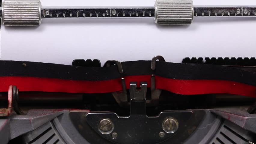 large text CONTACT US written with a vintage typewriter with black ink