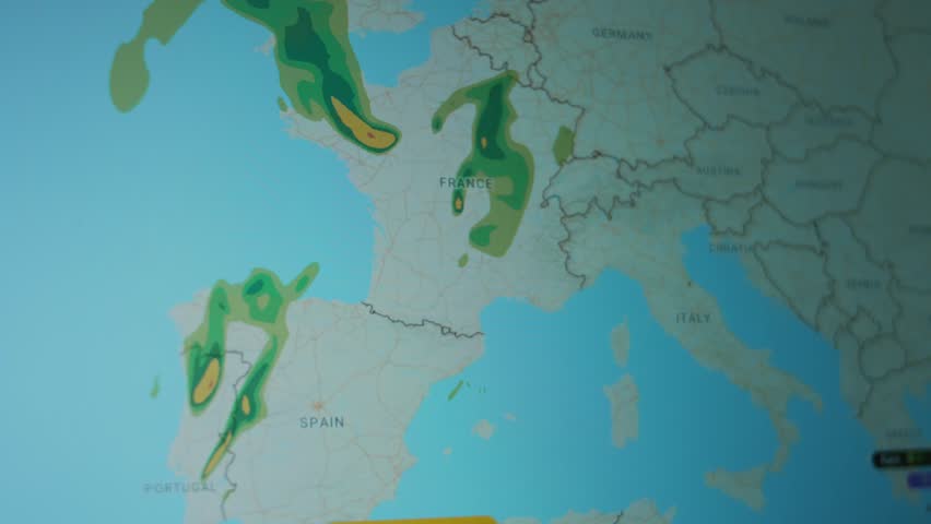 Weather forecast on world map on computer screen. Web service showing lightning occurring over France and Spain