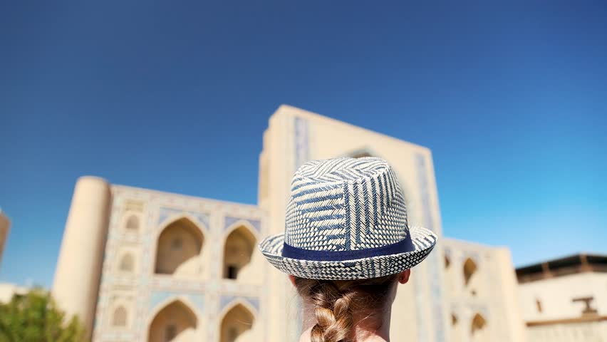 Young lady in ethnic dress in Khiva, Uzbekistan