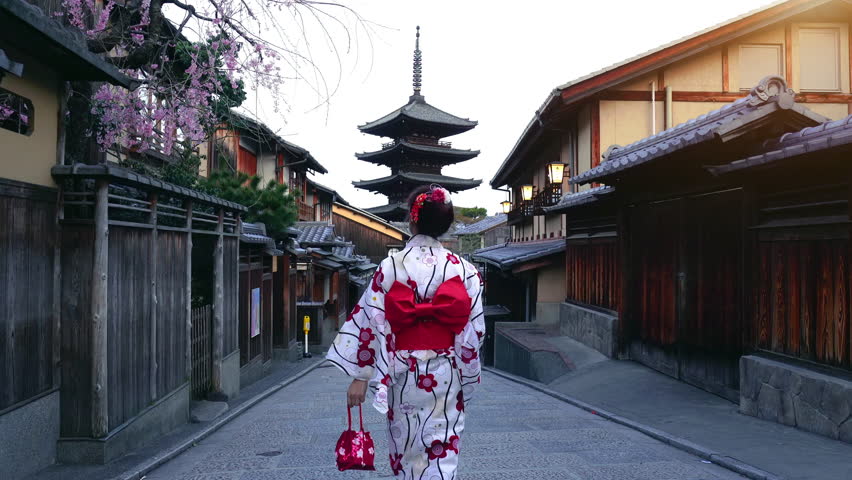 Asian woman wearing japanese traditional kimono at Yasaka Pagoda and Sannen Zaka Street in Kyoto, Japan. Royalty-Free Stock Footage #3482777835