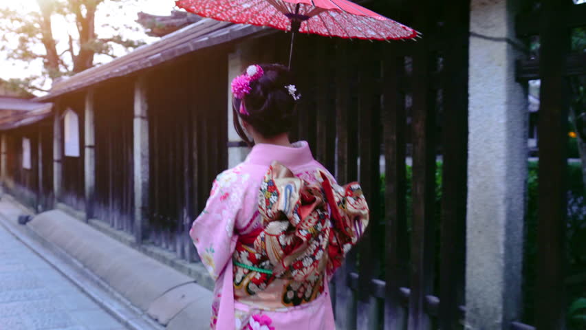 Asian woman wearing japanese traditional kimono at Yasaka Pagoda and Sannen Zaka Street in Kyoto, Japan. Royalty-Free Stock Footage #3482778285