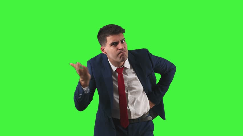 displeased expression of a businessman as he looks contrarily at the camera, with a furrowed brow, shaking his head raising a finger in denial, expressing frustration and anger Green Screen Chroma Key