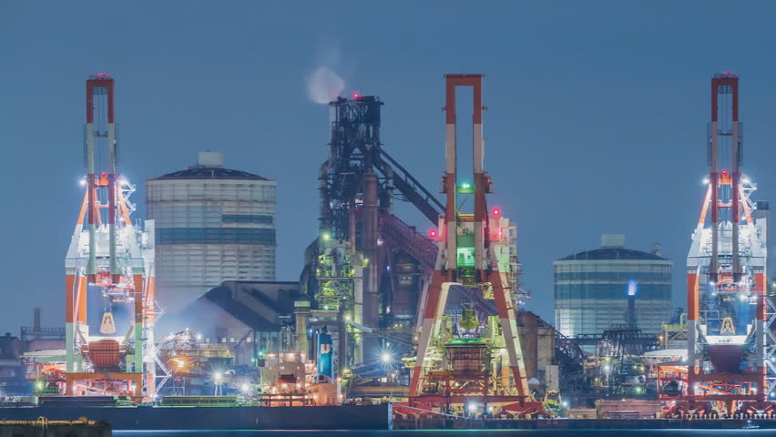 NAGOYA, JAPAN - Nagoya port. View of loading a cargo ship with ore. (time-lapse)