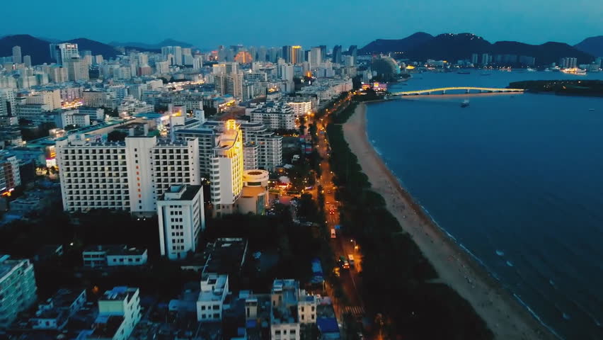 Haitang Bay, Sanya, Hainan Province, China. Aerial view of the night city.