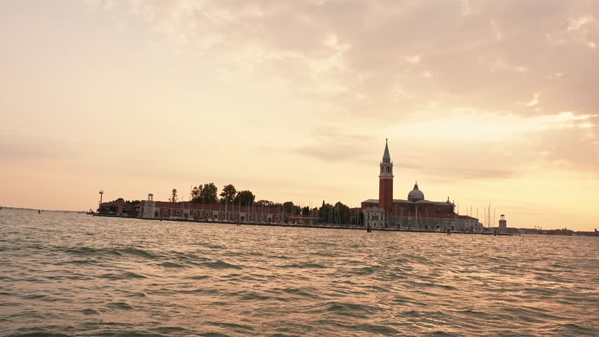 Beautiful view of the island and the church of San Giorgio Maggiore at sunset, Venice, Italy.