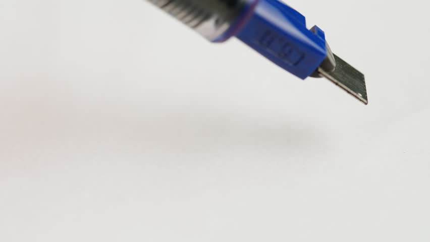 Extreme close-up of a blue fountain pen tip touching white paper, ready to write Royalty-Free Stock Footage #3483022795