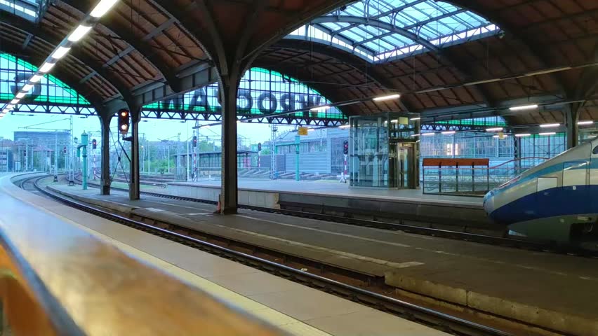 Modern express train departs from the Wroclaw railway station, Poland. 