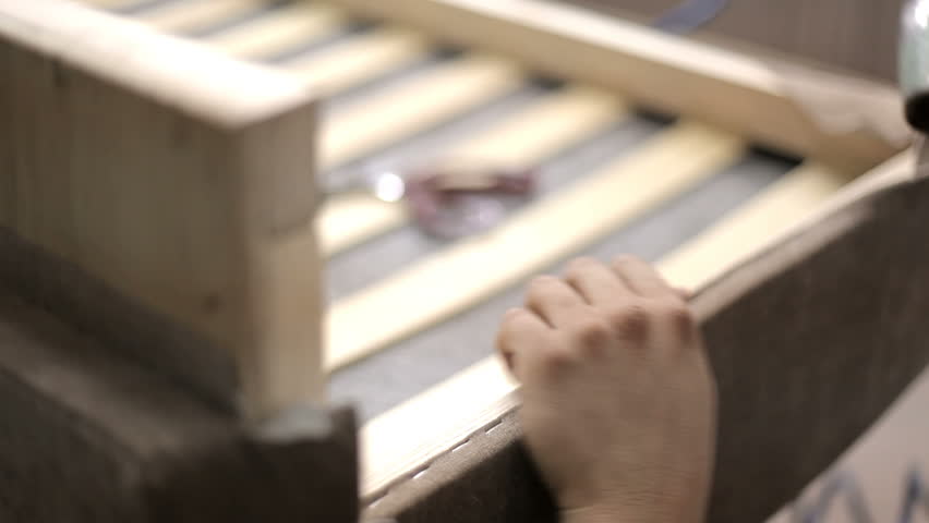 A worker makes a sofa in a furniture factory Royalty-Free Stock Footage #34831849
