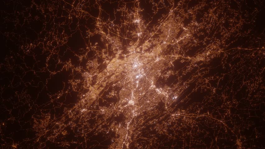 Birmingham (Alabama, USA) aerial view at night. Top view on city from space. Camera is zooming in, rotating clockwise