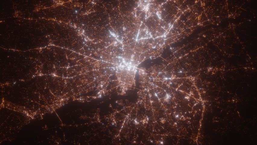 Philadelphia (Pennsylvania, USA) aerial view at night. Top view on city from space. Camera is zooming in, rotating clockwise