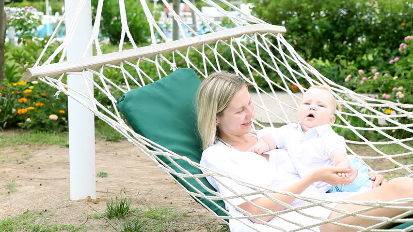 Happiness baby with mother in hammock   