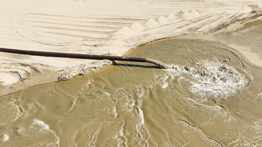 Aerial view of active dredging on Lake Michigan. Royalty-Free Stock Footage #3483408011