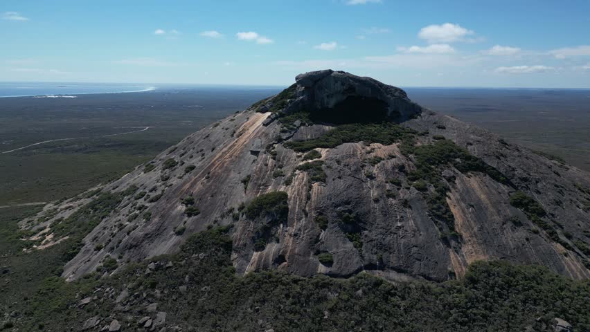 Frenchman Peak in Cape Le Grand National Park near Esperance, Western Australia. Aerial drone orbiting