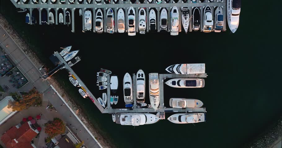 Rows Of Sailboats And Yachts Docked At Embarcadero Marina In San Diego, California, USA. - aerial shot