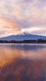 Vertical video. Time lapse of Fuji mountains and kawaguchiko lake at sunrise, Japan.