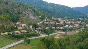 Aerial view of Llanars village.4k Resolution.Time lapse
Llanars is a small town in the Ripollés region,province of Girona,Catalonia,Spain, aerial view of the road and surroundings on a cloudy day.