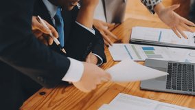 Strategic Business Discussion, Team Meeting for Market Growth and Financial Analysis, Engage in a strategic team meeting where business plans are presented, investors are consulted - Powered by Shutterstock - Get 15% off with code: PIKWIZARD15