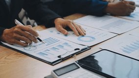 Strategic Business Discussion, Team Meeting for Market Growth and Financial Analysis, Participate in a collaborative team meeting focused on presenting business strategies, consulting investors - Powered by Shutterstock - Get 15% off with code: PIKWIZARD15