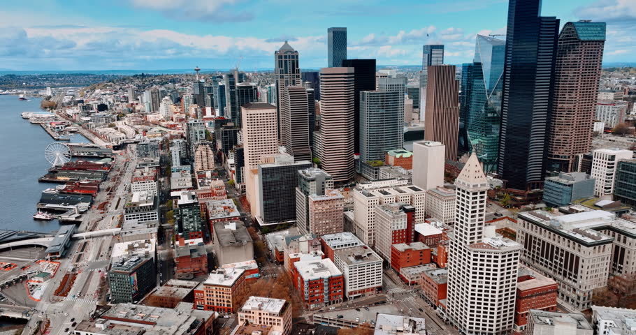 Urban scenery of modern Seattle, Washington, the USA at daytime. A group of skyscrapers in downtown located on the waterfront. Top view.