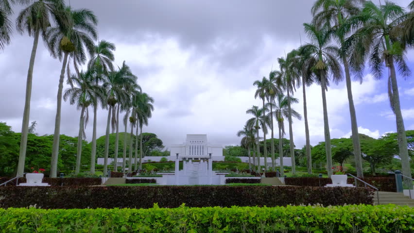 A view of Laie Hawaii Temple on a cloudy day. White building of mormon church in Oahu, Hawaii.
