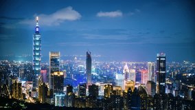 Urban Splendor at Night: Watching Dynamic Clouds Above a Dazzling Cityscape. View of Taipei city from the Four Beasts Mountain Trail, Taiwan - Powered by Shutterstock - Get 15% off with code: PIKWIZARD15