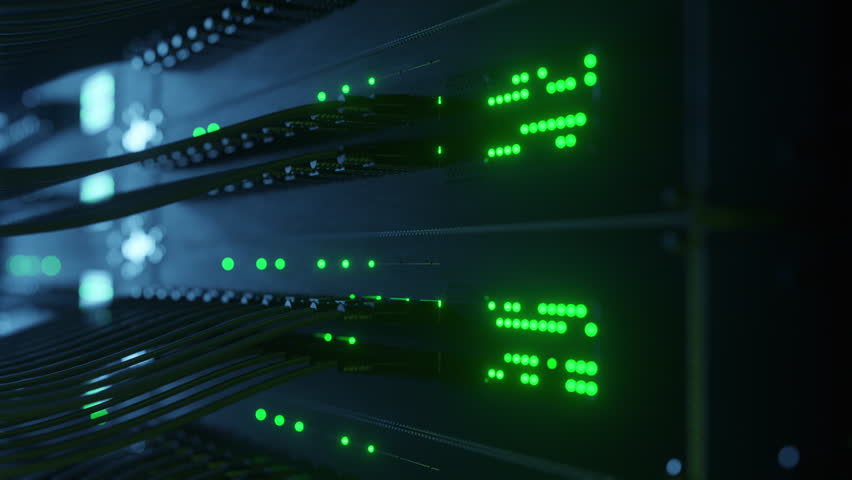 Close-up view of modern internet network switch with plugged ethernet cables. Blinking lights on internet server. Concept of big data center mining. Cloud computing and telecommunications
