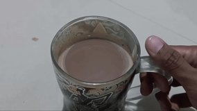 A glass of sweet chocolate milk
