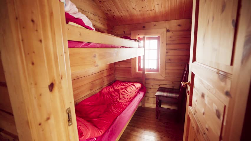 Cabin Bedroom With Bunk Beds In Verran, Norway. handheld shot
