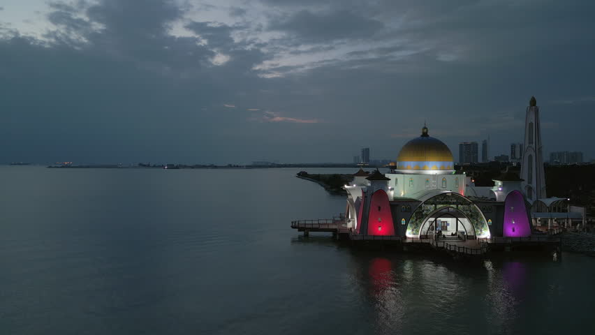 Masjid Selat Melaka Lighting Up In The Early Evening Drone Pull Back Royalty-Free Stock Footage #3484244221