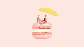 Stop motion. Animation. Two girls in swimming suit sitting on delicious dessert, macaron under beach umbrella. Concept of summer, mood, creativity, imagination, travelling, party, fun. - Powered by Shutterstock - Get 15% off with code: PIKWIZARD15