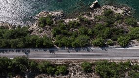 Drone Video of Cyclists Advancing on the Aegean Village, Aegean Beach and Bicycle Path, Izmir Türkiye (Turkey)