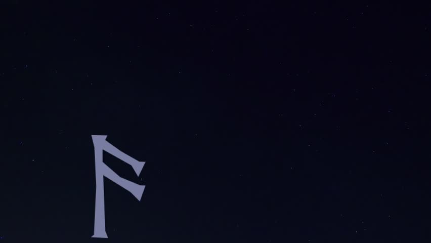 video of a Star trail in the background, 
with in the foreground the image of a rune 
moving towards the polar star of the same star trail, 
the rune in this clip is Ansuz