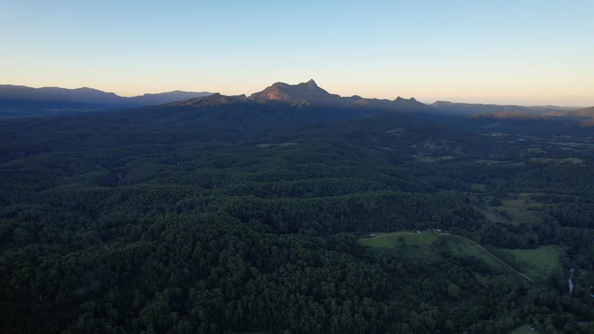 Mount Warning Mountain In Distance On Tweed Range, Northern Rivers, New South Wales, Australia. Aerial Wide Shot Royalty-Free Stock Footage #3484384443