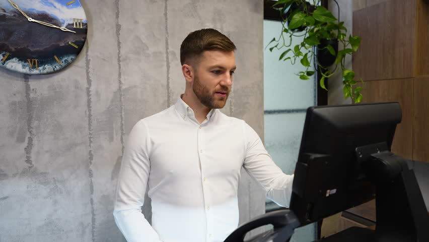 Friendly receptionist welcomes client