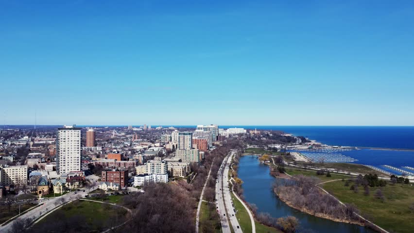 static timelapse of commuter traffic at midday along Lake Michigan in Milwaukee, WI