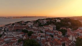 Lisbon, Portugal 4K Aerial video in motion Tagus river Sunset sky  Panorama view