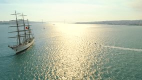 Portugal Lisbon 4k travel video. Aaerial view of city ship yacht boat sailing ship sky no clouds sailing
