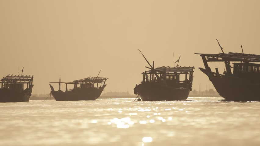 boats on the shore of the Arabian Gulf Royalty-Free Stock Footage #3484492847