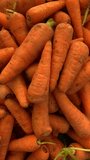 video of a group of carrots in a market. Food and vegetable concept.