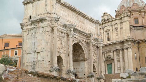 The Arch of Septimius Severus in Palatino one of the white big forts inside the tourists spot in Rome Italy